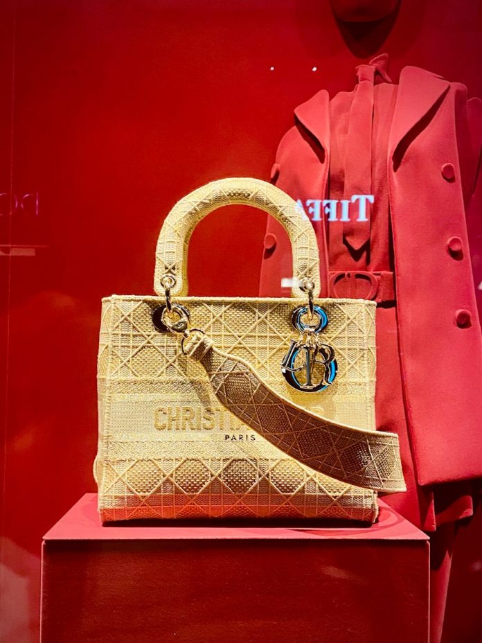 red and brown leather handbag